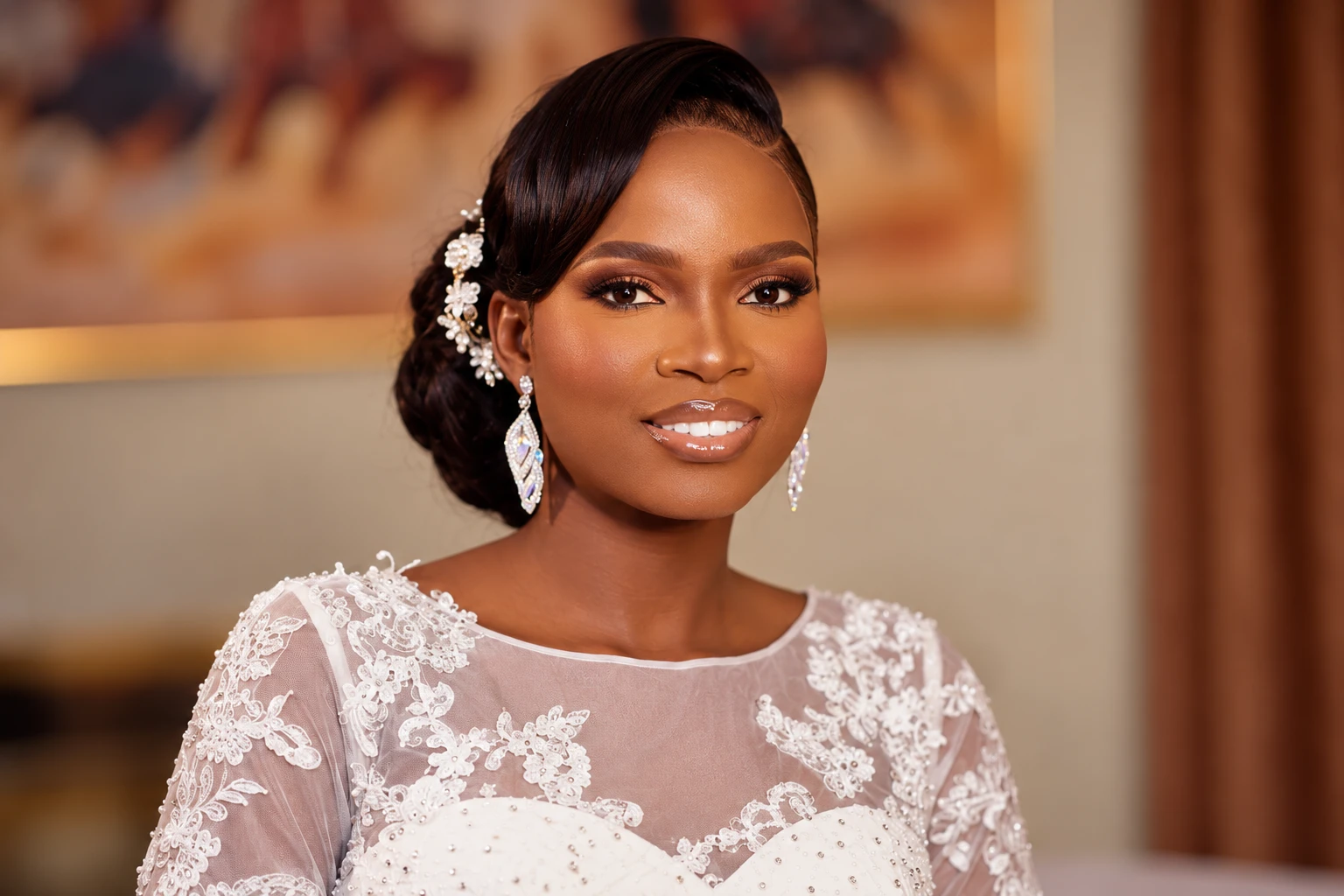 Bride with a sleek pinned updo and soft glam makeup