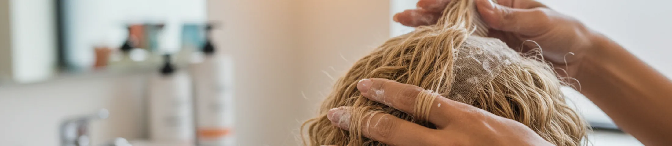 Stylist restoring a wig